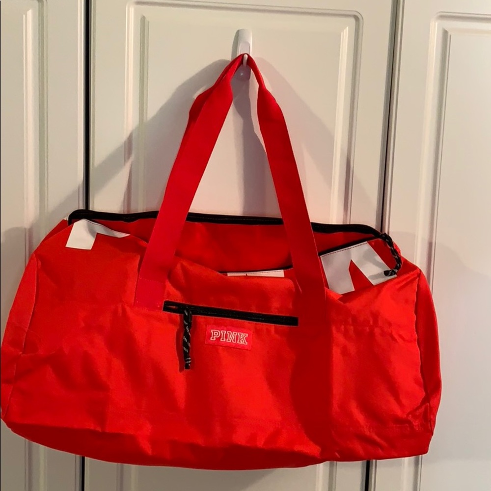 Large Victoria’s Secret pink duffel bag